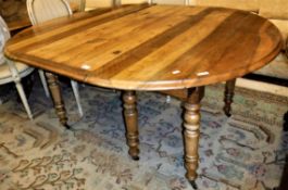 A pine and walnut D end dining table Size 158cm long x 72cm high x 128cm deep extended