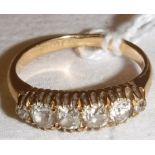 An 18 carat gold five stone diamond set ring, size P, total weight 3.7 g, approx 0.