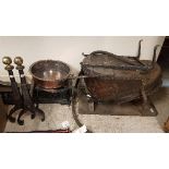 A collection of metal wares to include a pair of blacksmiths bellows, a chimney crane,