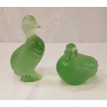 A Lalique green glass figure of a Mandarin duck and another Lalique green glass figure of a seated