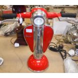 A red painted and polished metal "Vespa" table lamp