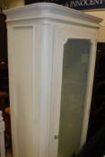 A cream painted glazed single door cabinet Size approx.
