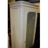 A cream painted glazed single door cabinet Size approx.