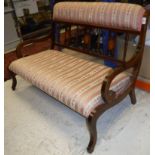 An Edwardian salon settee with striped upholstery Size approx.