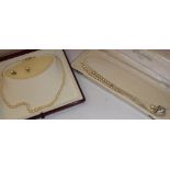 A single strand graduated pearl necklace with 9 carat gold clasp,