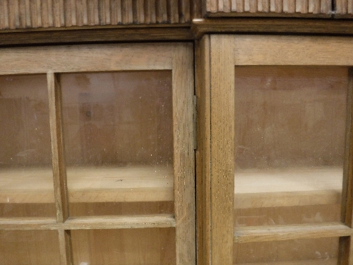 A large oak framed breakfront bookcase cabinet in the Arts and Crafts taste with six glazed and - Image 14 of 23