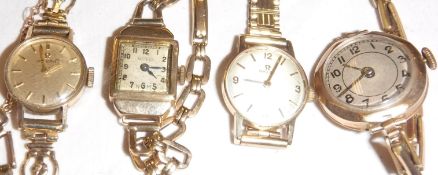 Two Omega 9 carat gold ladies wristwatches, together with two further 9 carat gold watches,