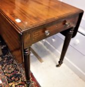 An early 19th century Pembroke table in the manner of Gillows,