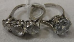 An 18 carat white gold three stone set dress ring, size L approx 4.