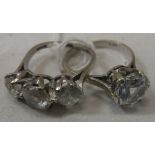 An 18 carat white gold three stone set dress ring, size L approx 4.