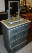 A 20th century green and cream painted chest of four drawers and matching dressing mirror and
