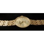 A 9 carat gold Geneve Quartz ladies wristwatch with 9 carat gold strap, approx 16.