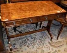 A modern burr maple veneered two drawer side table in the regency style on end pillar supports