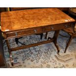 A modern burr maple veneered two drawer side table in the regency style on end pillar supports