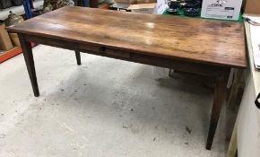 A 19th Century French fruit wood and chestnut farmhouse kitchen table,