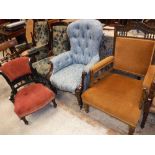 A Victorian mahogany show framed and button upholstered salon arm chair,