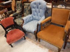 A Victorian mahogany show framed and button upholstered salon arm chair,