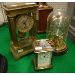 A 19th Century French mantel clock of architectural form with four fluted columns the drum case