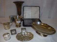 A collection of silver and plated wares to include a silver oval pedestal dish,