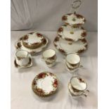 A Royal Albert "Old Country Roses" part tea service comprising three tier cake stand, cake plate,