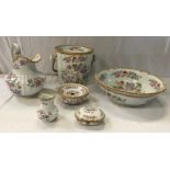 A late Victorian Cauldon china six piece floral transfer decorated toilet set,