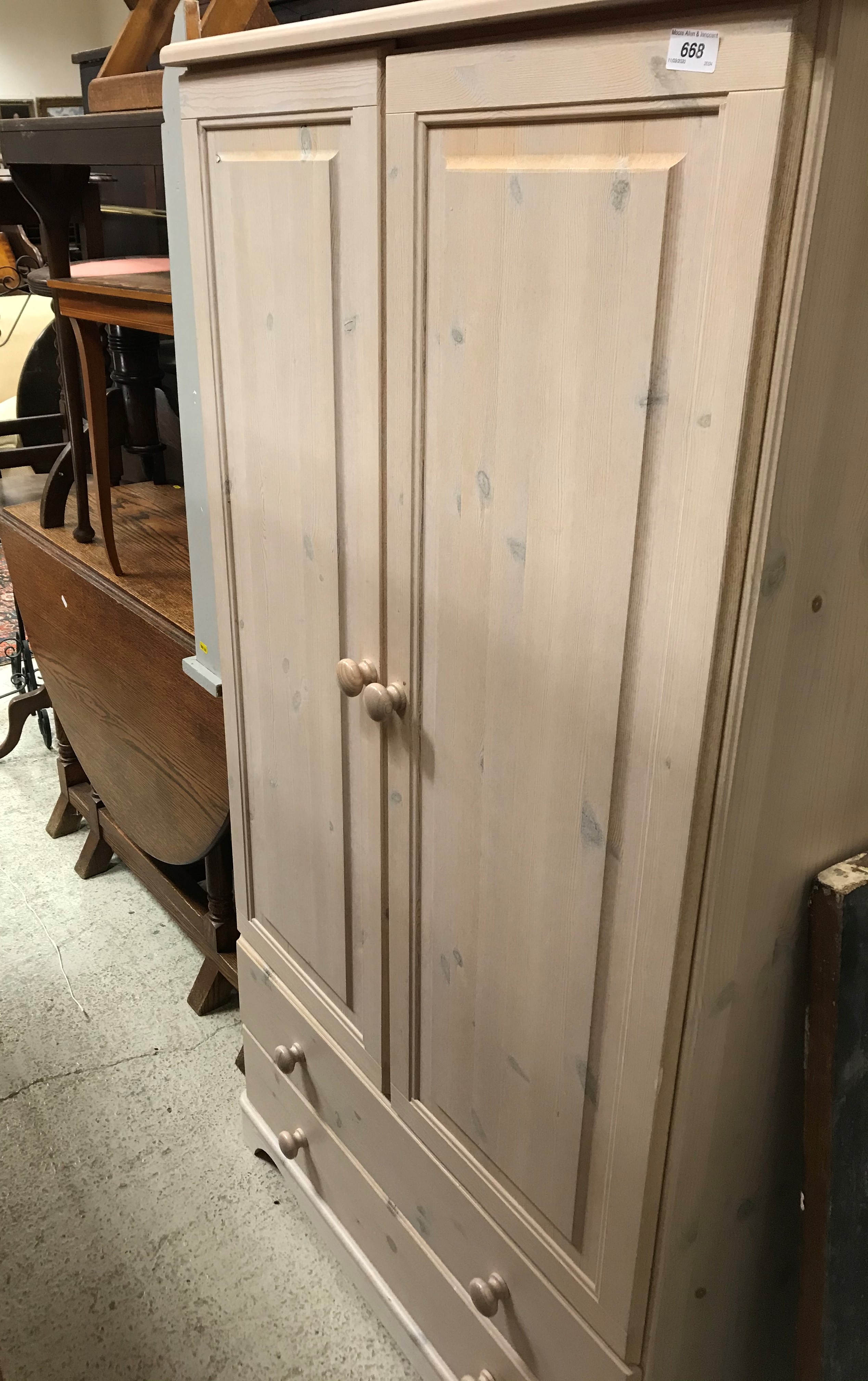 A circa 1900 walnut chest of four short over one long drawer, together with a modern pine wardrobe,