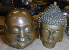 A modern bronze of a Sino Tibetan Buddha head and a bronze paperweight as a four-faced head.