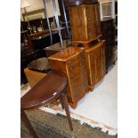 A mahogany bow fronted chest of six drawers, three modern yew wood serpentine fronted chests,