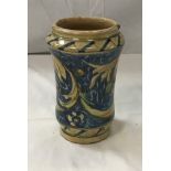 An 18th / 19th Century Sicilian maiolica albarello decorated with flowers, approx 16.