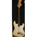 A Fender Squire Strat 6 string electric guitar,