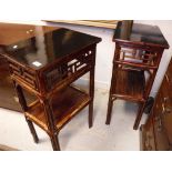 A pair of Chinese lacquered and bamboo two tier occasional tables or lamp tables,