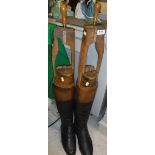A pair of gentleman's black and tan leather riding boots, together with trees (size unknown,