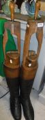 A pair of gentleman's black and tan leather riding boots, together with trees (size unknown,