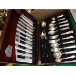 A collection of plated wares to include a Butler of Sheffield part canteen of cutlery,