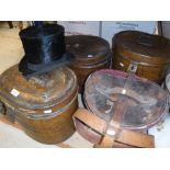 Three painted tin hat boxes, a leather hat box and silk top hat together with two chamber pots,