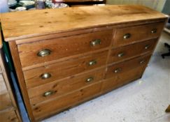 A pine bank of six drawers with brass handles Size approx 155cm long x 91cm high x 44cm deep