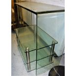 A modern three-tier glass and chrome coffee table together with a modern glass console table size
