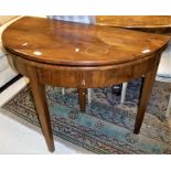 A 19th Century mahogany demi-lune fold over tea table Size approx.