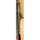 A collection of various fishing requisites including a pair of Ronny waders, wading staff,