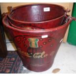 A graduated set of three reproduction "Coca Cola" buckets