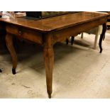 An early 19th Century French fruit wood farm house kitchen table the plank top with cleated ends