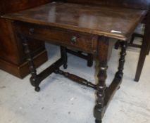 WITHDRAWN - An oak single drawer side table in the circa 1700 manner raised on turned and ringed