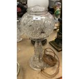 An early 20th Century cut glass lamp 46cm tall