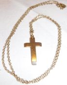 A 9 carat gold pendant as a cross, the pendant approx 3 cm long including suspension hook, approx 5.