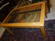 A modern beech framed coffee table with panelled slate tile top Size approx.