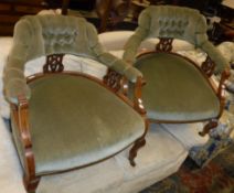 A pair of stained beech framed Edwardian salon tub chairs Size approx.