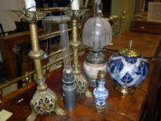 A pair of pierced brass Continental table lamps,