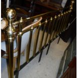 A Victorian style king size brass bed headboard
