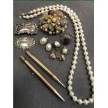 A collection of costume jewellery to include simulated pearl necklace, three pairs of earrings,