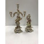 A pair of Dresden figural candlesticks,